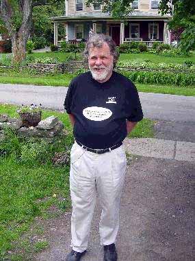 [photo: Beat Generation writer Charles Plymell in Moody's Skidrow Beanery shirt, Cherry Valley, NY, 2002. Copyright 2002, Pat O'Connor.]